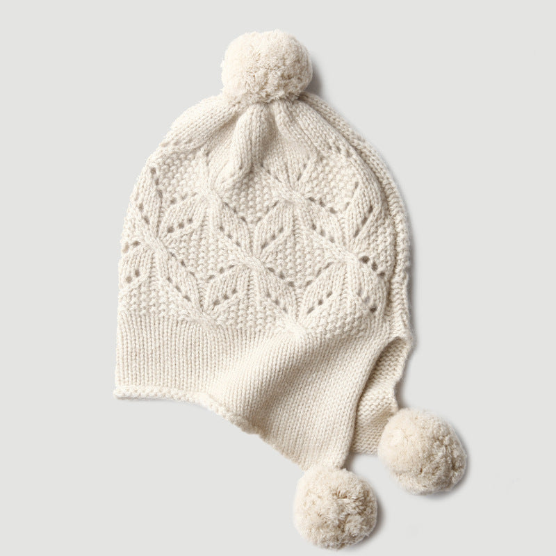 Knitted cashmere, hat, hollow twisted flower, wool hat, autumn and winter, warm and thickened hat.